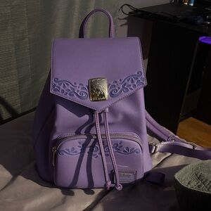 Purple Backpack with Embossed Design